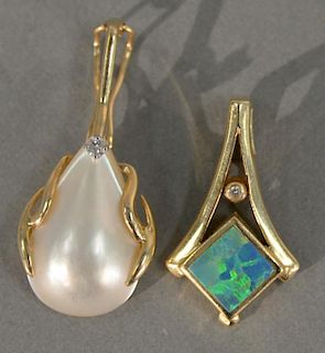 Two 14K pendant, one set with opal and small diamond, one set with pearl and diamond. 6.5 grams.