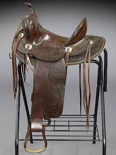 Tooled leather Western style saddle,