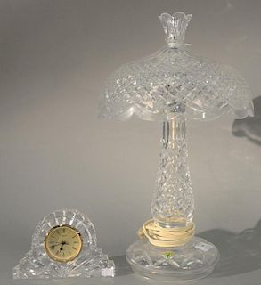 Two Waterford crystal pieces, table lamp and a small clock. Lamp ht. 19in., clock ht. 4 1/2in., lg. 7in. Provenance: Property