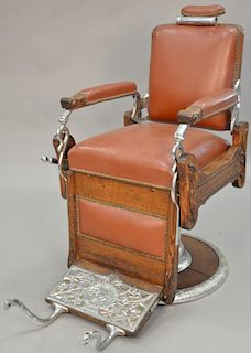 Koken Barber chair with oak frame, adjustable height. Provenance: Property from the Estate of Frank Perrotti Jr. of Hamden, C