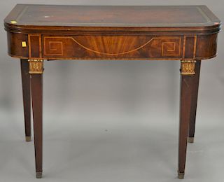 Two piece lot to include mahogany leather top console table oopens to full table (no leaves) and a podreuse. table: ht. 30 1/