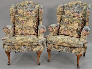 Pair of Queen Anne style wing chairs with tapestry style upholstery.