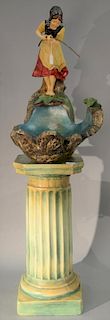 Plaster figure of a girl fishing in clear glass bowl on pedestal (bowl has hairline).  total ht. 53 1/2in. Provenance: Proper