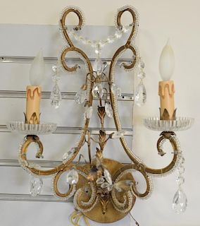 Set of four two light sconces having crystal boebashes and prisms.