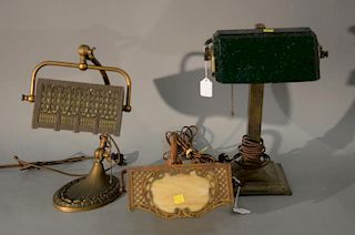 Three desk lamps including two panel shade and one emerald lite style (one very low). ht. 5 1/2in., 16in., & 16in. Provenance