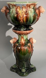 Majolica planter on pedestal, each with lion heads. ht. 22in., dia. 13 1/2in.