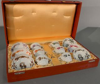 Set of six Meissen porcelain dragon demitasse cups and saucer set in fitted box marked with crossed swords. cup ht. 2in.