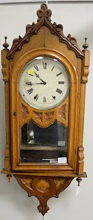 Oak regulator clock, Gothic design, interior with mirror back. ht. 38in. Provenance: Property from the Estate of Frank Perrot