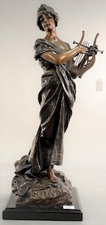 Recast bronze figure of a woman with lyre instrument, on black base. ht. 30in. Provenance: Property from the Estate of Frank