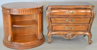 Two piece lot to include round table with shelves on two sides, and a three drawer side chest. ht. 29in., wd. 32in., table: h