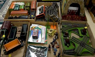 Lionel vintage train set including two engines, crane car, etc. with track, switches, tunnel, and four billboards plus lead t