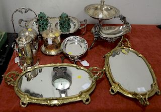 Group lot to include silverplate tea pot, two biscuit jars, figural compote, and two bureau plats with brass frame. Provenanc