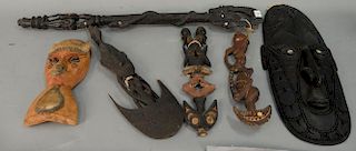 Group of six African wall hanging figures and masks. ht. 14in. to 39in.