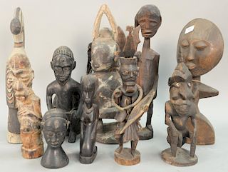 Group of ten African tribal sculptures, mix of metal and wood. ht. 7in. to 20in.