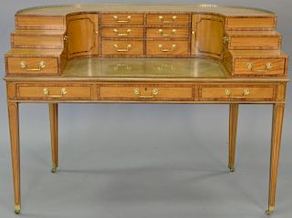 Baker collector's Edition stepback desk with tooled leather top with brass capped feet, ht. 39in., wd. 52in., dp.28in.