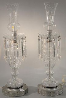 Pair of cut crystal hurricane lamps. ht. 32in. Provenance: Property from the Estate of Frank Perrotti Jr. of Hamden, Connecti