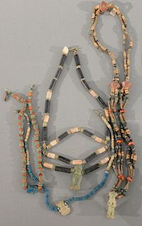 Group of four Egyptian Faience beaded necklaces with stone glazed figures.