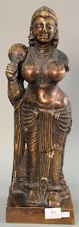 Large bronze standing figure of a topless deity figure. ht. 19 1/2in.