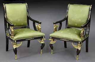 Pr. Empire style armchairs with bronze mounts