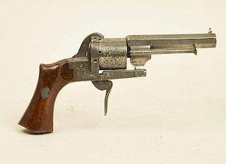 LeFaucheux a Paris pinfire pocket revolver, fully engraved, with folding trigger, .32 caliber.
