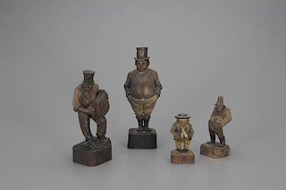 Four Carved Figures