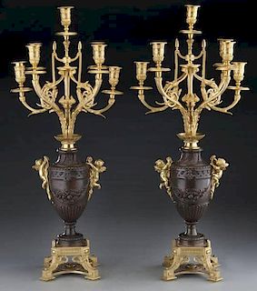 Pr. Louis XV style dore and patinated 7-light