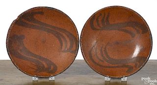 Pair of redware plates, 19th c.