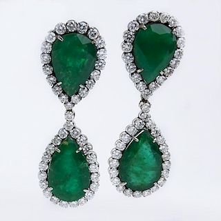 70.0 Carat Pear Shape Colombian Emerald, 11.0 Carat Round Brilliant Cut Diamond  and Platinum Pendant Earrings.
