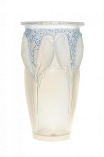 A Rene Lalique Molded and Opalescent Glass Vase, Height 9 3/8 inches.