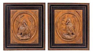 A Pair of Continental Carved Panels Height 26 3/4 x width 32 1/4 inches (framed).