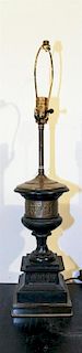 A Neoclassical Slate and Bronzed Metal Urn Height overall 27 inches.