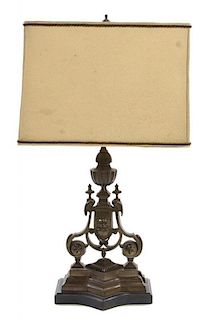 A Neoclassical Style Bronze or Cast Metal Lamp Height overall 31 inches.