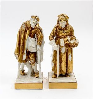 * A Pair of Capodimonte Gilt Decorated Porcelain Figures Height 6 1/2 inches.