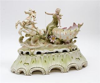 * A Continental Porcelain Figural Group Width 13 inches.