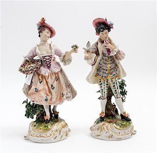 * Two German Porcelain Figures Height 10 1/2 inches.