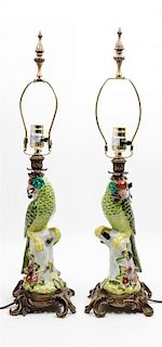 * A Pair of Continental Porcelain Figural Lamps Height overall 25 1/2 inches.