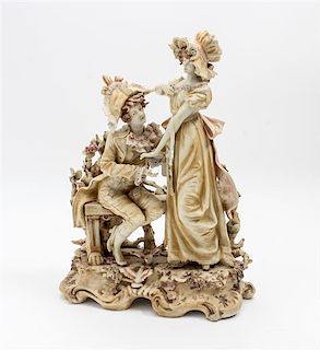* A Continental Porcelain Figural Group Height 12 3/4 inches.