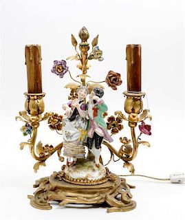 * A Continental Porcelain and Gilt Bronze Figural Lamp Height overall 11 1/2 inches.