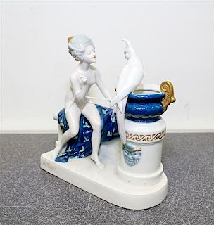 A Rosenthal Porcelain Figural Group Height 6 3/4 x width 6 1/2 inches.