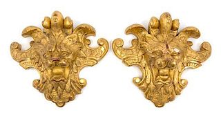 * A Pair of Italian Giltwood Wall Ornaments Height 10 1/2 x width 11 1/4 inches.