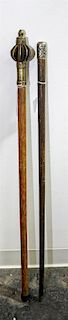 * A Group of Two Canes Length of longest 35 1/4 inches.