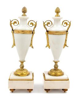 * A Pair of Gilt Metal Mounted Marble Urns Height 12 inches.