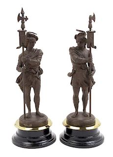 * A Pair of Cast Metal Figures Height overall 18 1/4 inches.