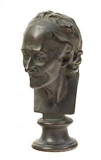 * A Continental Bronze Bust of Voltaire Height 9 inches.