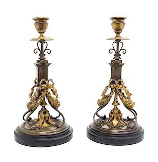 * A Pair of Continental Gilt Bronze Candlesticks Height 10 1/4 inches.