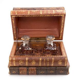 * A French Faux Book Form Decanter Set Width 8 1/2 inches.