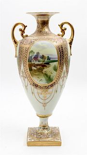 * A Nippon Porcelain Vase Height 16 1/4 inches.