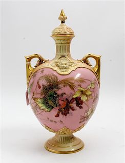 * A Royal Worcester Porcelain Covered Vase Height 14 inches.