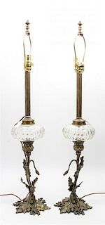 * A Pair of Gilt Metal Lamps Height overall 35 inches.