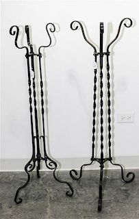 A Near Pair of Victorian Wrought-Iron Stands Height 41 inches.